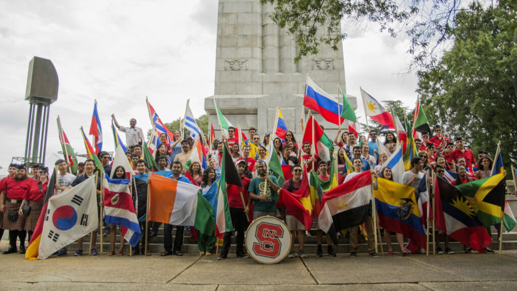 Parade of Flags photo in front of the NC State Memorial Belltower.